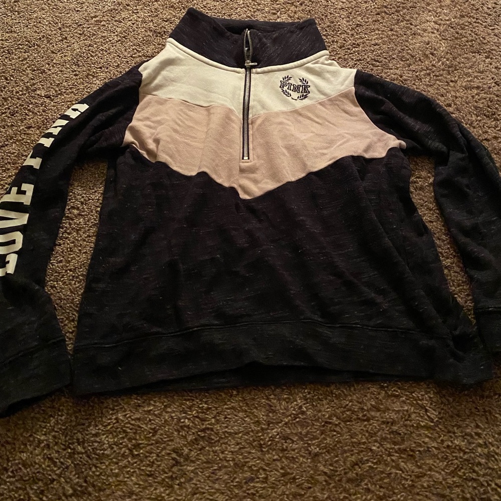 Pink quarter zip hoodie.